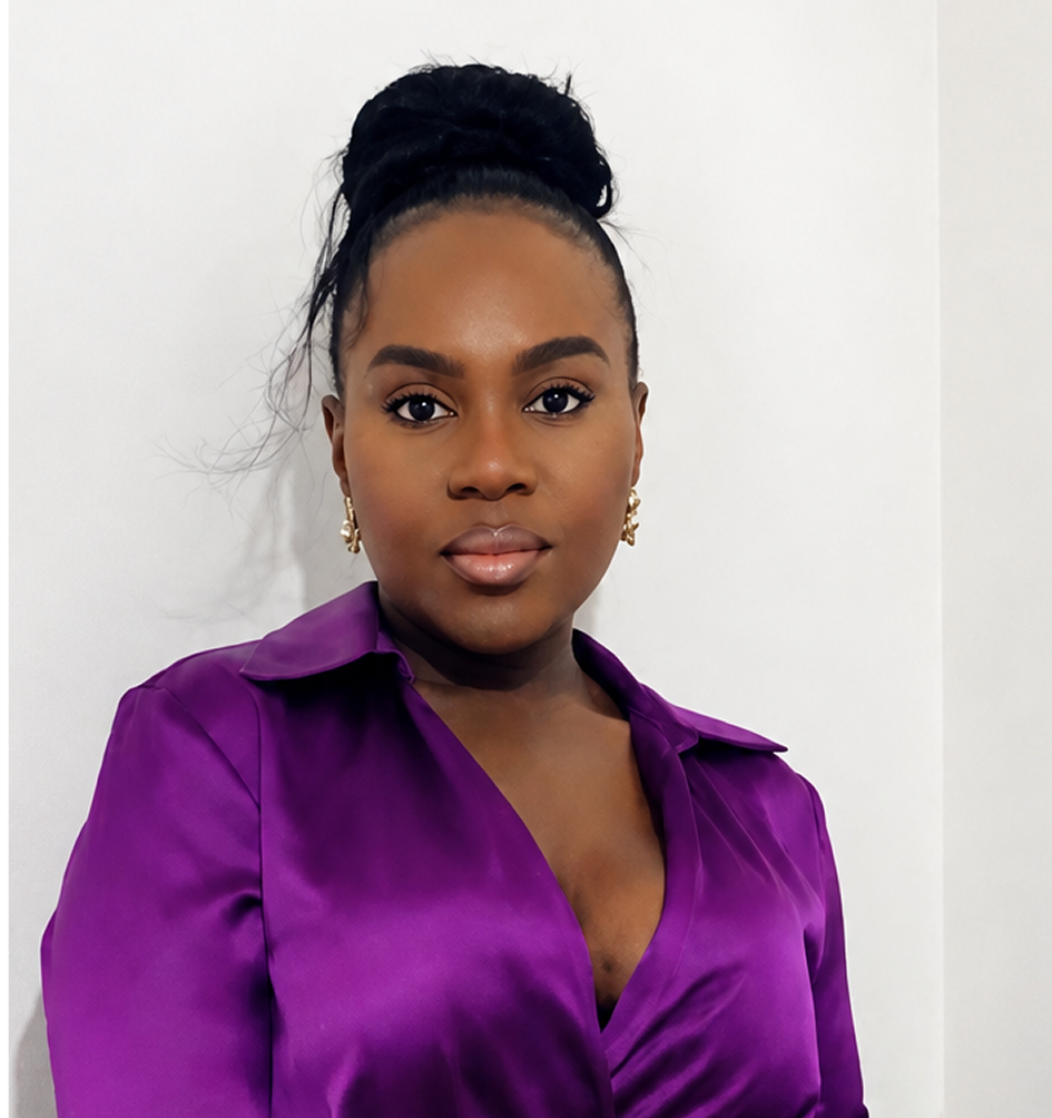 Woman wearing a purple shirt against a white background